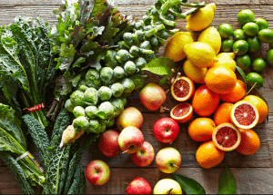 a group of fruits and vegetables on a wood surface Healthy Weight Loss Diets Shoreham Beach